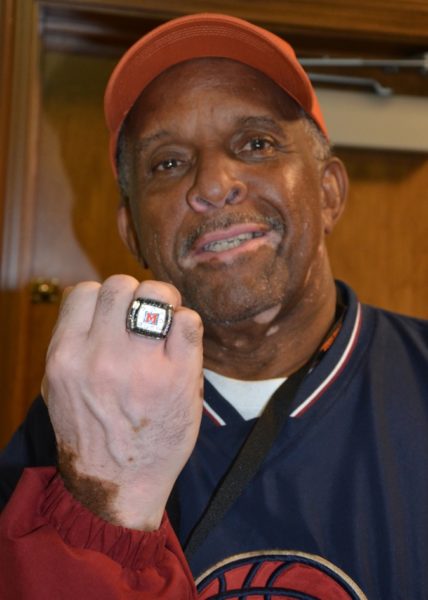 a picture of Bill Poole showing his sports ring