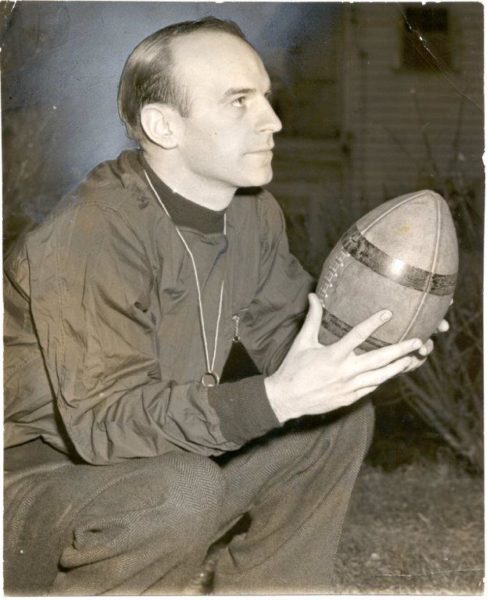 Paul Brown holding a NFL ball